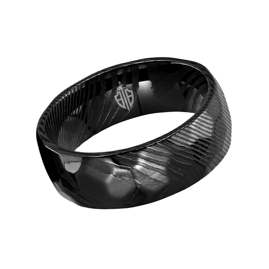 Men's wedding band made with hammered black Damascus steel