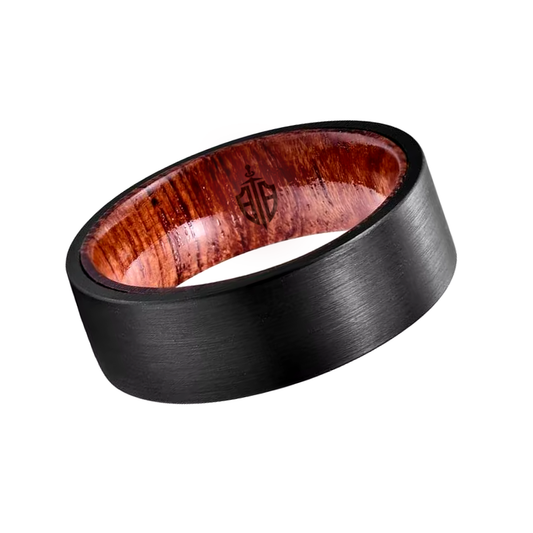 Wooden men's wedding ring with a black brushed tungsten shell – a stylish and durable band combining natural wood with modern tungsten.