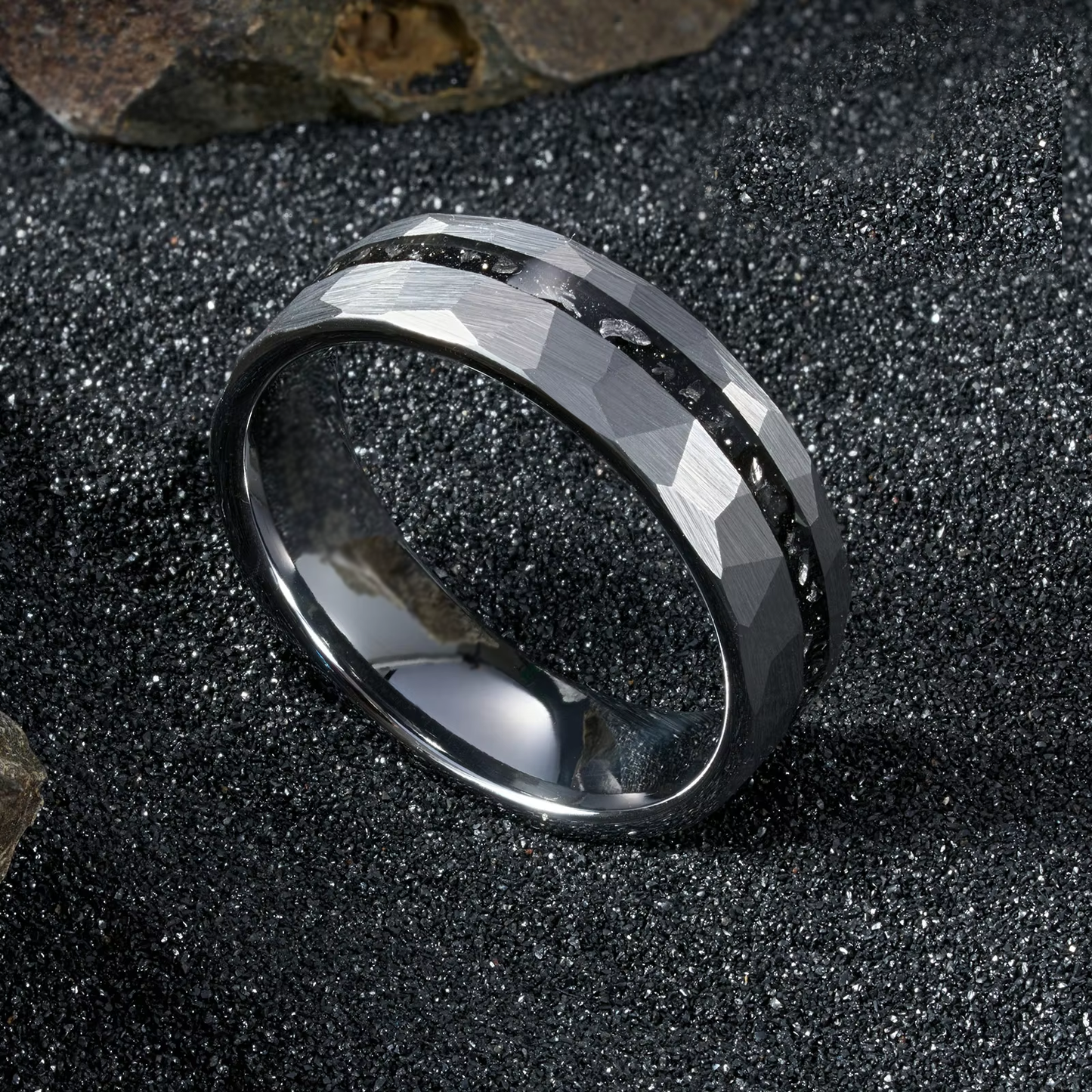 Hammered silver tungsten men's wedding band with black opal inlay – a durable and unique ring featuring a striking opal accent.