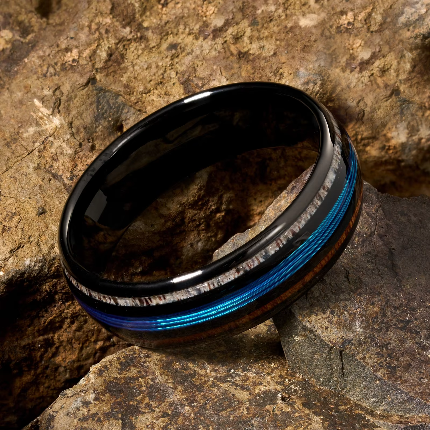 Wood and tungsten men's wedding ring with fishing line inlay – a rugged yet unique band, perfect for anglers and outdoor enthusiasts.