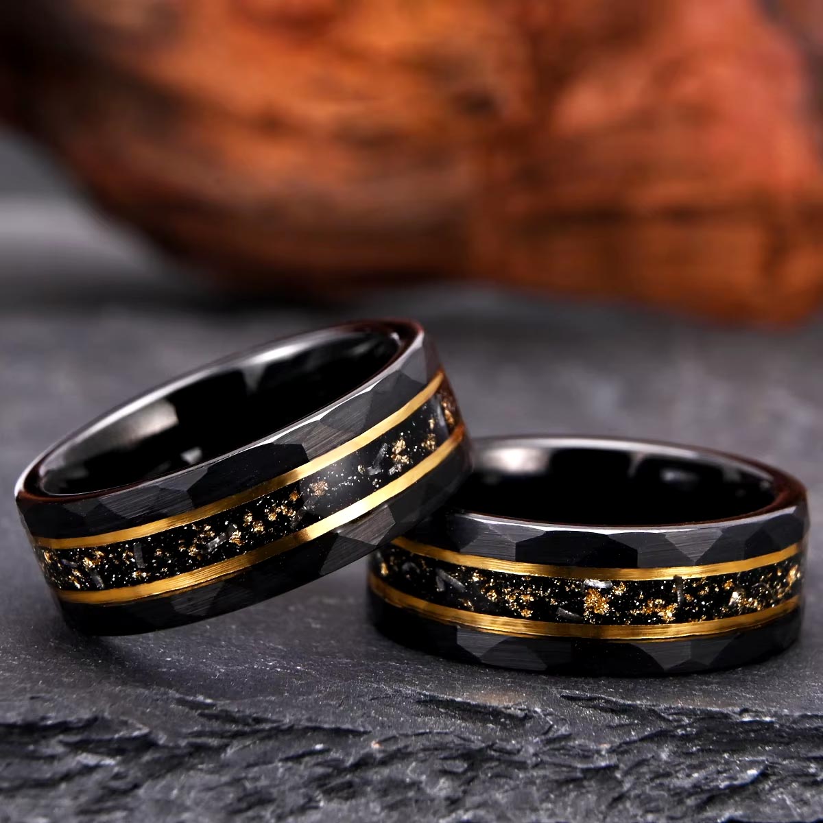 Black hammered tungsten ring with opal and gold inlay – a rugged yet elegant men's wedding band with a unique blend of durability and style.