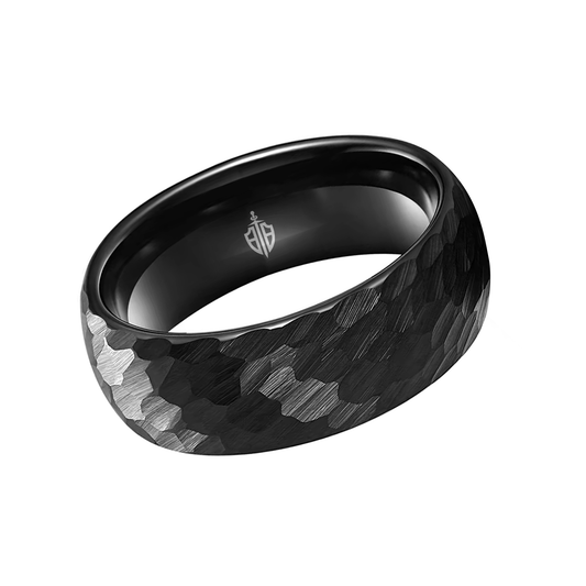 Men's wedding band made with hammered black tungsten.